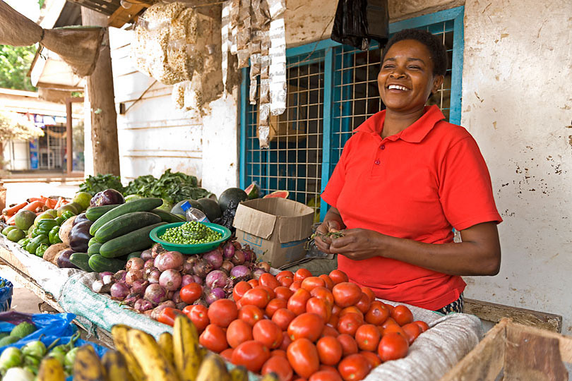 A Chagga woman selling fresh vegetables in Moshi town.