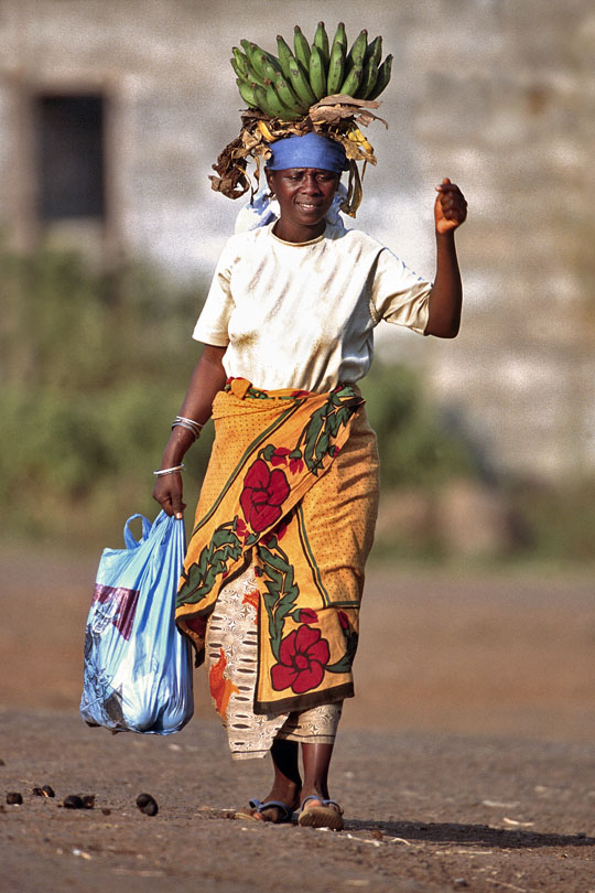 A Chagga woman returns from shopping on a local market.