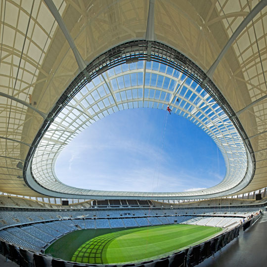 Worker checking the roof structure before&lt;p&gt; opening of the Cape Town Stadium