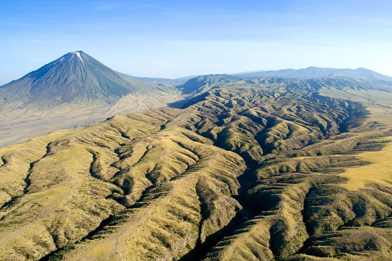 Ol Doinyo Lengai active volcano and eroded landscape, Tanzania