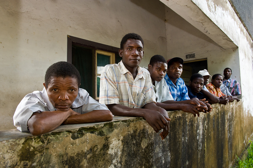Husbands waiting for their wives and children&lt;p&gt; outside a HIV-AIDS clinic